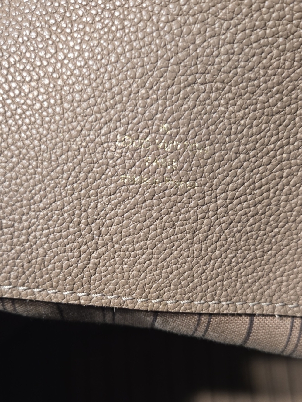 Vuittion Monogram Empreinte Hobo. - Picture 8 of 10